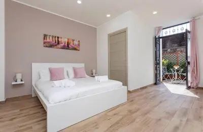 Letto o letti in una camera di Vitali Home