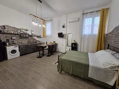 Letto o letti in una camera di Mini Loft 96018