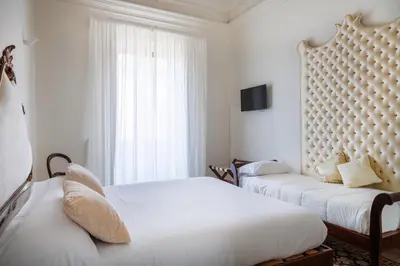 Letto o letti in una camera di Francalanza City Rooms