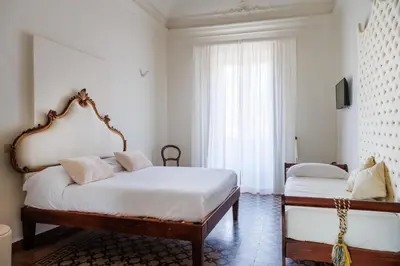 Letto o letti in una camera di Francalanza City Rooms