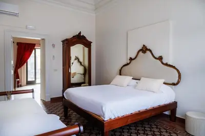 Letto o letti in una camera di Francalanza City Rooms