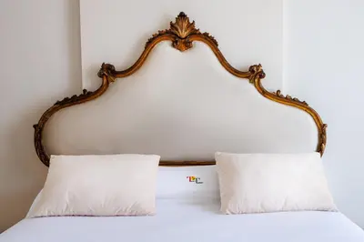 Letto o letti in una camera di Francalanza City Rooms