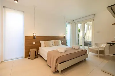 Letto o letti in una camera di Casa Marza Rifugio al mare - IsulaTravel