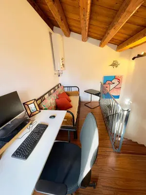 Area soggiorno di Artemis Deluxe - Elegante terratetto nel cuore di Ortigia