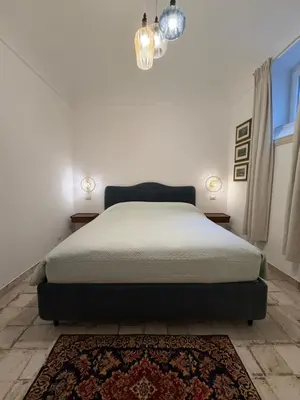 Letto o letti in una camera di Gelsomina Retreat Home