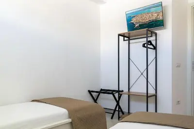 Letto o letti in una camera di Golden Bay Appartments