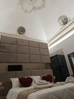 Letto o letti in una camera di Ursino inn camere e suite