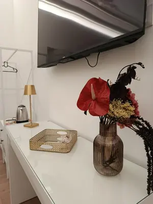 TV o dispositivi per l'intrattenimento presso Ursino inn camere e suite