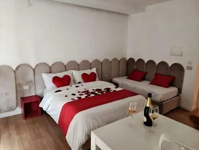 Letto o letti in una camera di Ursino inn camere e suite