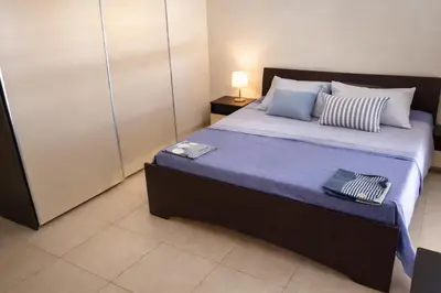 Letto o letti in una camera di Elò house