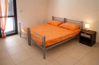 Letto o letti in una camera di Elò house