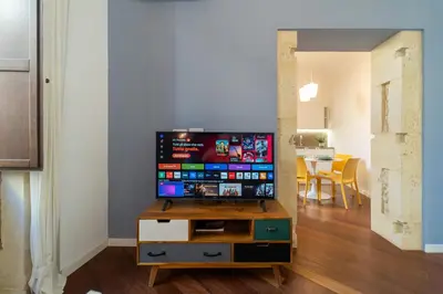 TV o dispositivi per l'intrattenimento presso GuestHost - I Limuni di Mirabella Flat in Ortigia