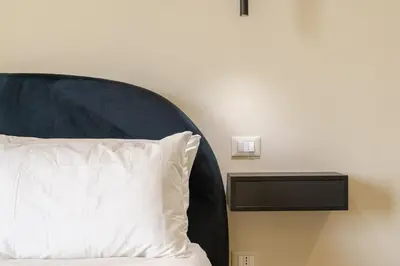 Letto o letti in una camera di Kitai, sui tetti di Catania
