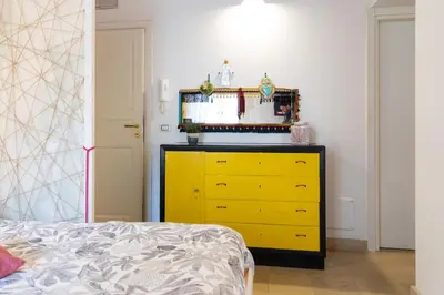 Letto o letti in una camera di GuestHost - Quattro Cuori Ortigia Comfy Studio