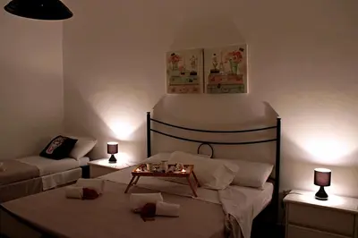 Letto o letti in una camera di La Casa dell'isola