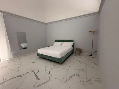 Letto o letti in una camera di Vulcano Rooms 3