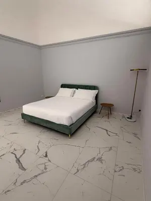 Letto o letti in una camera di Vulcano Rooms 3