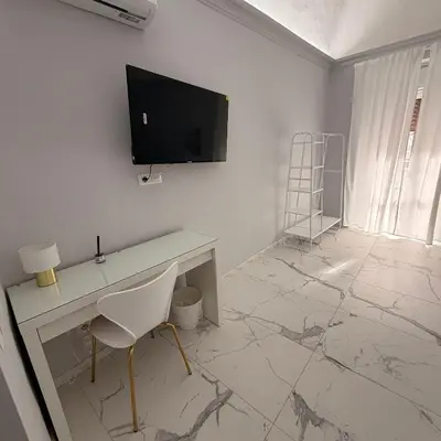 TV o dispositivi per l'intrattenimento presso Vulcano Rooms 3
