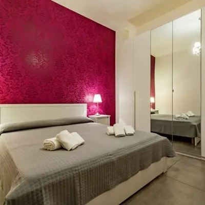 Letto o letti in una camera di Agatocle Residence Ortigia