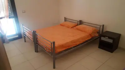 Letto o letti in una camera di Villa Eloro
