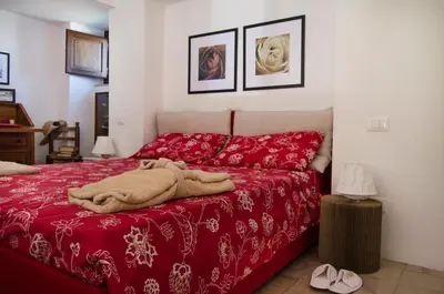 Letto o letti in una camera di Dimora La Rosa Barocca