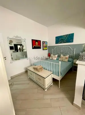 Letto o letti in una camera di Donna Sicilia Ortigia