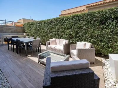 Area soggiorno di Apartment Wohnung Two Palms by Interhome