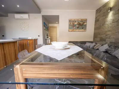 Area soggiorno di Apartment Wohnung Two Palms by Interhome