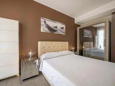 Letto o letti in una camera di Apartment Wohnung Two Palms by Interhome