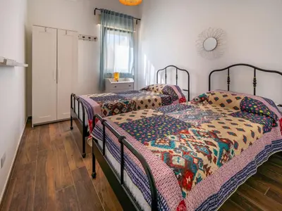 Letto o letti in una camera di Apartment Villa Nisa Wohnung by Interhome