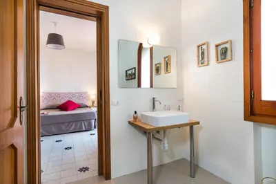 Letto o letti in una camera di Villa Mari - Sea View Heated Pool - Baia del Riccio