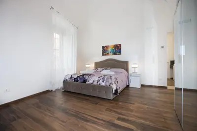 Letto o letti in una camera di Premiere Luxury Catania