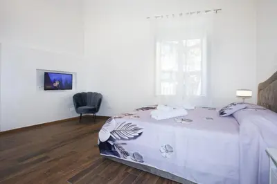 Letto o letti in una camera di Premiere Luxury Catania