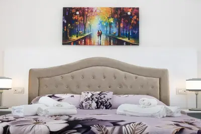 Letto o letti in una camera di Premiere Luxury Catania