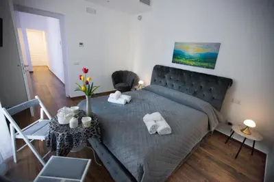 Letto o letti in una camera di Premiere Luxury Catania