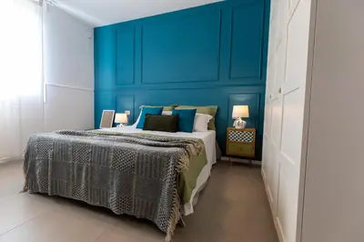 Letto o letti in una camera di Villa Giaira SicilyMyhome