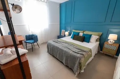 Letto o letti in una camera di Villa Giaira SicilyMyhome