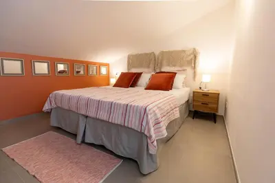 Letto o letti in una camera di Villa Giaira SicilyMyhome