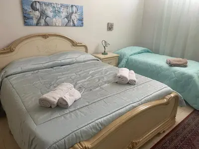 Letto o letti in una camera di Lavica Home