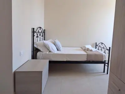 Letto o letti in una camera di Casa Perry