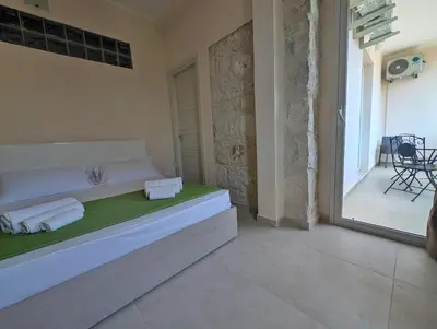Letto o letti in una camera di Casa Perry