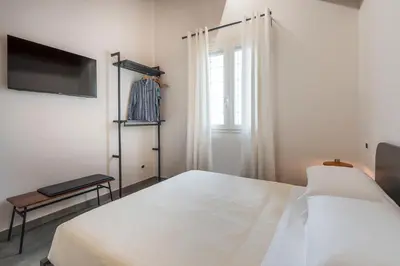 Letto o letti in una camera di Dimora Bufalefi