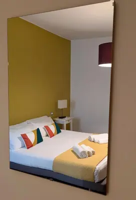 Letto o letti in una camera di Casa Cindy
