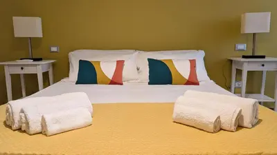 Letto o letti in una camera di Casa Cindy