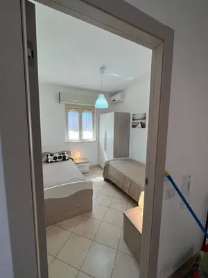 Letto o letti in una camera di Marzamemivacanze