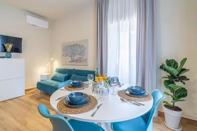 Area soggiorno di Appartamenti Santo Spirito by Made in Ortigia Apartments