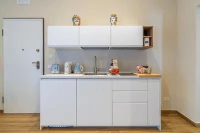 Cucina o angolo cottura di Appartamenti Santo Spirito by Made in Ortigia Apartments