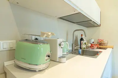 Cucina o angolo cottura di Appartamenti Santo Spirito by Made in Ortigia Apartments