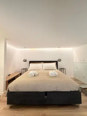Letto o letti in una camera di Ortigia elegant loft