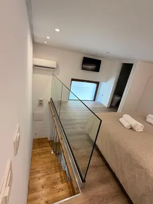 Letto o letti in una camera di Ortigia elegant loft